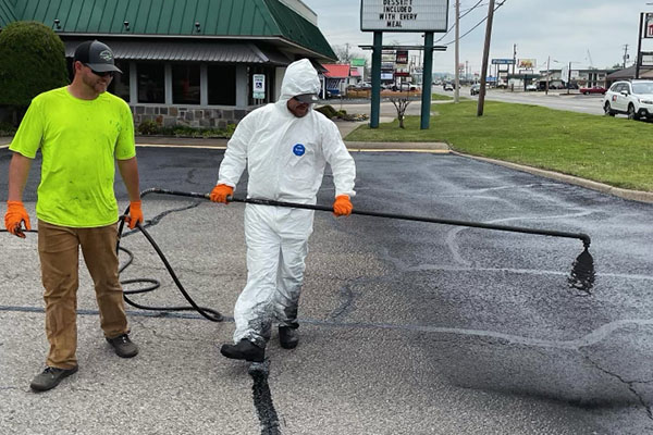 How Summer Heat Damages Asphalt in Northwest Arkansas - Parking Lots Plus asphalt blog